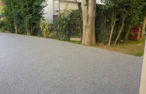 Aménagement extérieur avec pose d'un sol en moquette de pierre - Préfailles 44770