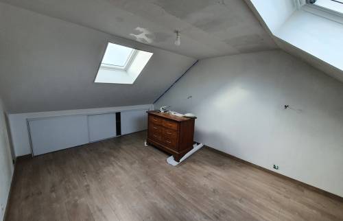 Ajout de Velux pour apporter de la lumière naturelle dans la maison rénovée