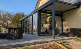 Aperçu de la véranda et de la pergola - Extension et aménagement extérieur