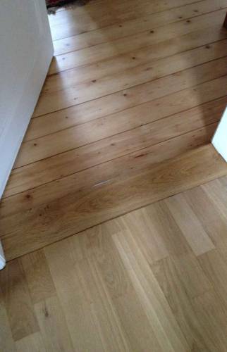 Parquet massif rénové à Saint Louis