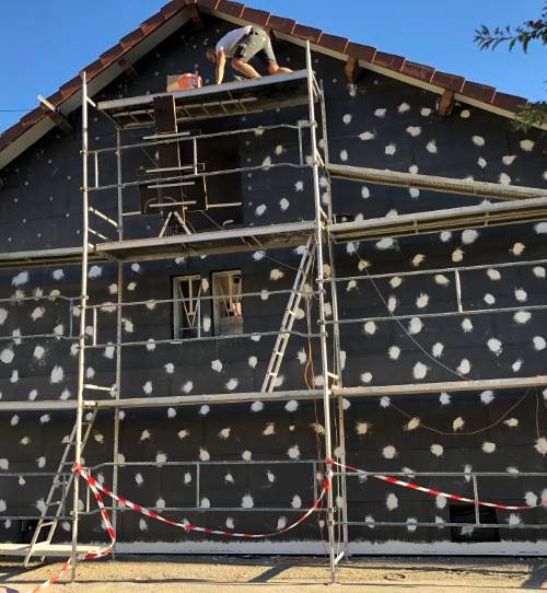 Pose des panneaux d'isolation