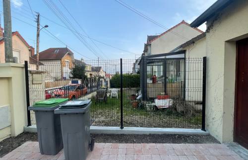 Rénovation de clôture et de revêtement de sol extérieur à Massy