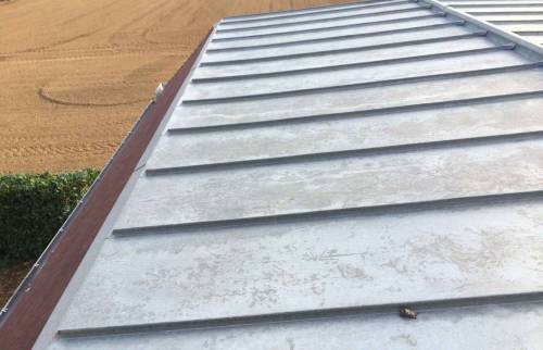Réaliser un garage accolé en zinc à Caen