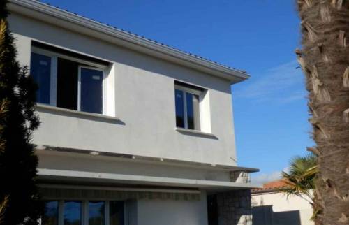 Repeindre la façade d'une maison à Pessac