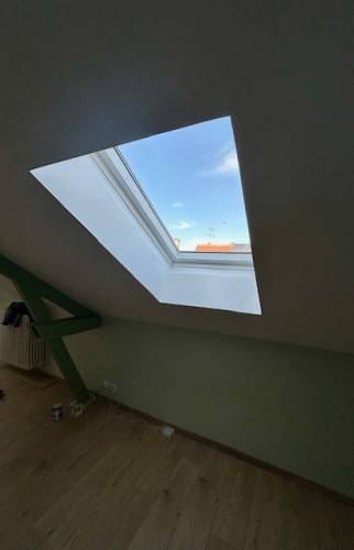 Aménagement de combles pour une maison à Troyes fenêtre