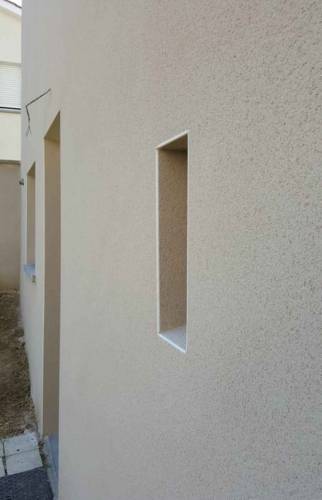 Ravalement d'une Façade en Pisé - Lyon / Francheville