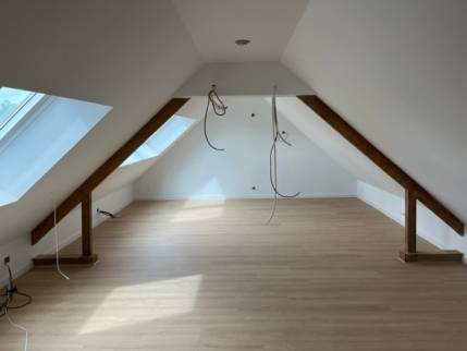 Création d'un espace de vie lumineux après travaux d'aménagement de combles - Nantes 44