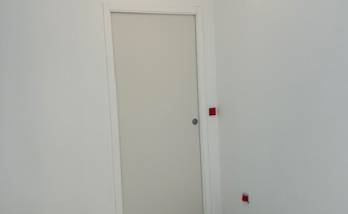 Transformation d’un garage en chambre à La Rivière-de-Corps porte