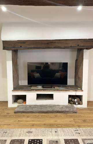 Cheminée modernisée après rénovation à La Guerche-de-Bretagne