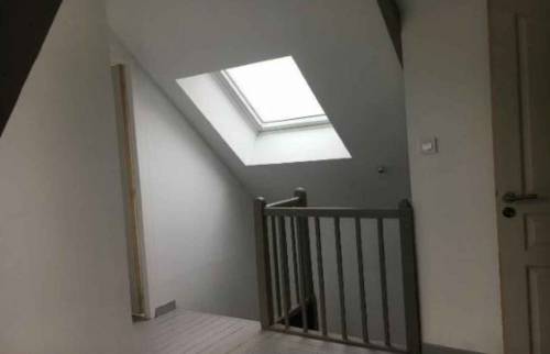 Palier velux puit de lumière - Transformation d'un garage en habitation La Maison des Travaux Rouen 