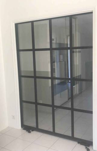 Installation d'une porte verrière loft