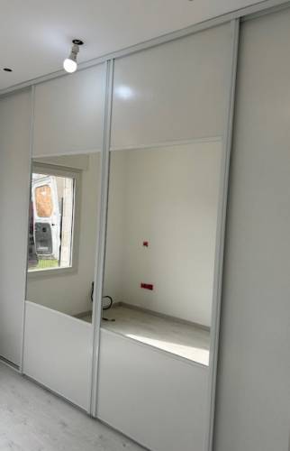 Transformation d’un garage en chambre à La Rivière-de-Corps dressing