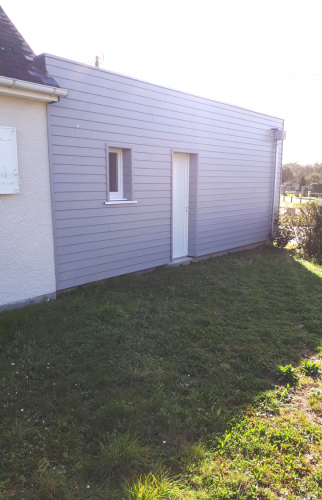 Finition bardage bois peint en gris