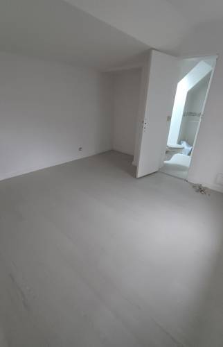 Pose d'un sol PVC dans l'extension