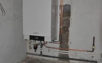 Chaudière à gaz haute performance posée en rénovation énergétique de maison - Servon 77170