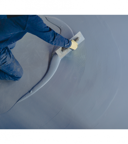 mise en œuvre d'une résine sur un sol de garage à Talant (21)