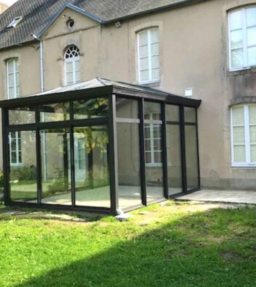Création d'une véranda sur Éterville 14930