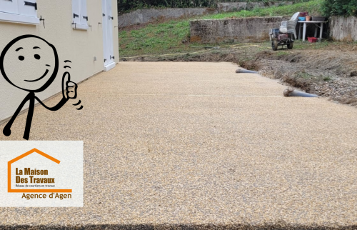 Une nouvelle terrasse en béton désactivé pour moderniser l’extérieur d’une maison à Pont-du-Casse.