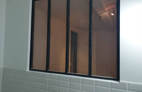 Découpe mur porteur après étude BET pôur insertion verrière d'atelier mi-hauteur sur chambre attenante à Pleyben (29190)