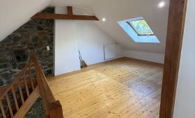 Rénovation de maison près de Vigneux-de-Bretagne : isolation sous toiture, VMC, PAC air/air et peinture pour un meilleur confort après