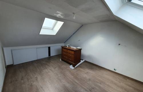 Ajout de Velux pour apporter de la lumière naturelle dans la maison rénovée