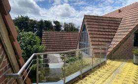 Pose d'un isolant au sol de la terrasse de toit 