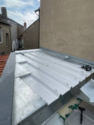 Renforcement de l'isolation de toit d'une maison (03200)