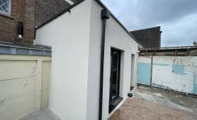 Agrandissement maison terminée finition enduit lissé