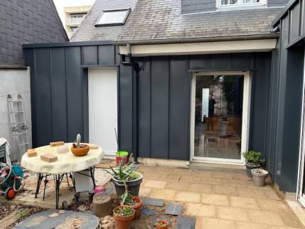 Prolongement du bardage en zinc sur la façade de la maison - Nantes 44000