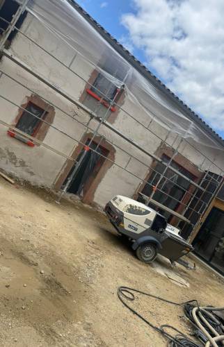 Rénovation de la façade et des ouvertures d'une ancienne grange à Voiron