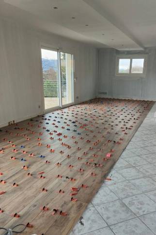 Pose du revêtement de sol - Travaux en cours