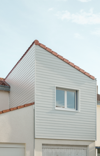 Surélévation de maison à Rezé (44400) - ossature bois bardage bois détail sur la surélévation