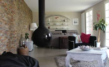 rénovation de maison Le Plessis-Robinson avec cheminée et mur de pierres