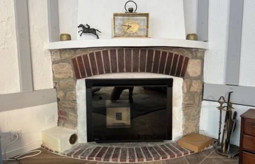 Insert à granulés dans une cheminée à Deauville