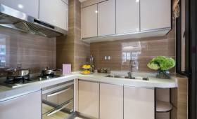 Rénovation de cuisine en appartement avec façades inox sur Osny (95)