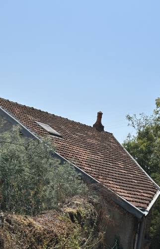 Rénovation de toiture à Onet le Château : tuiles remplacées et démoussées