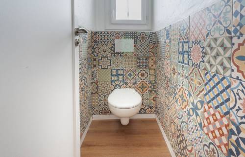 Maison à Dardilly (69570) : Pose de sol souple PVC en pose flottante dans le séjour, la cuisine et les toilettes rénovés