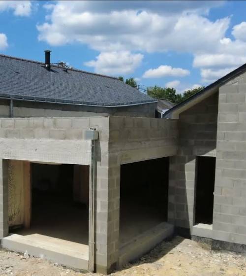 Agrandissement d'une maison en parpaing