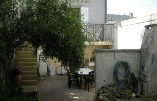 Le jardin et l'arrière de la maison avant les travaux