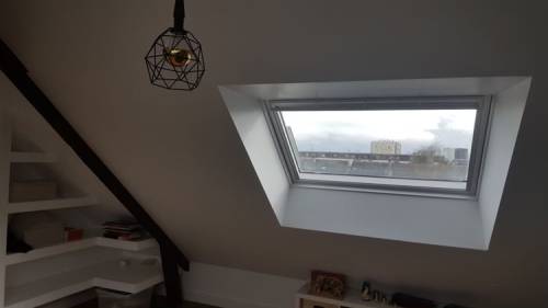 Rénovation d'une salle de bain avec intégration d'un Velux