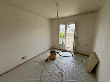 Travaux de rénovation de murs de salon dans un appartement - Nantes 44