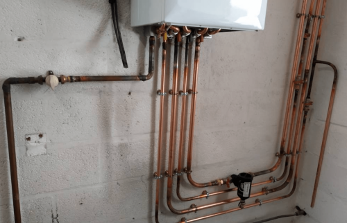 installation tuyauterie chaudière gaz