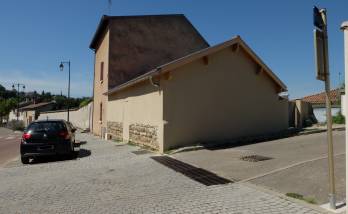 Réalisation d'un garage double avec portail coulissant, attenant à une maison existante, commune de l'ouest de Lyon