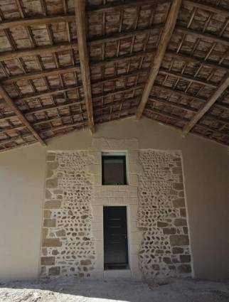 Façade en pierre apparente après rénovation - Alixan 26300