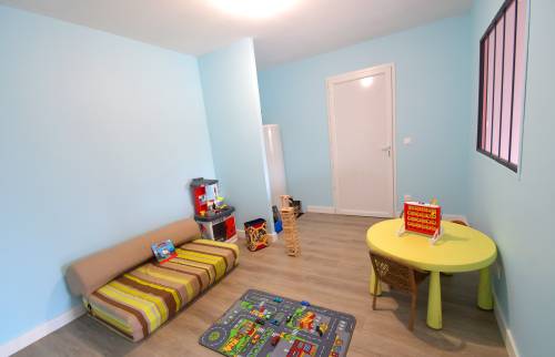 Création d'une salle de jeux dans un garage à Champier