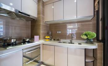 Rénovation de cuisine en appartement avec façades inox sur Osny (95)