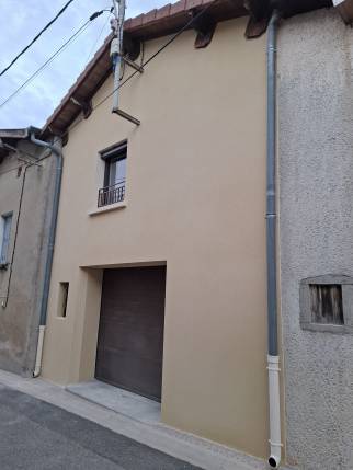 Mur extérieur de maison rénové après travaux de ravalement de façade - Meximieux 01800