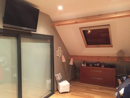 Installation d'une baie vitrée dans la chambre parentale