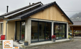 véranda Sallanches, extension maison Sallanches, rénovation véranda montagne, pose baie vitrée Sallanches, artisan charpente couverture, La Maison des Travaux Chamonix Mont-Blanc
