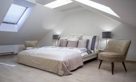 Aménagements de combles en suite parentale, maison située à Limonest